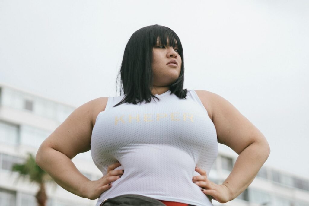 photo of woman wearing white tank top