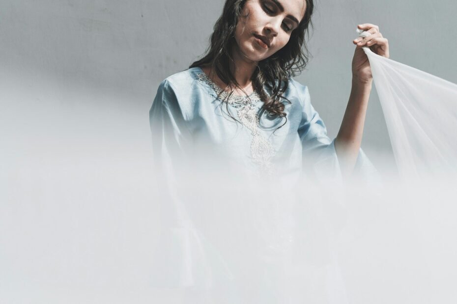 woman in white crew neck t-shirt smiling